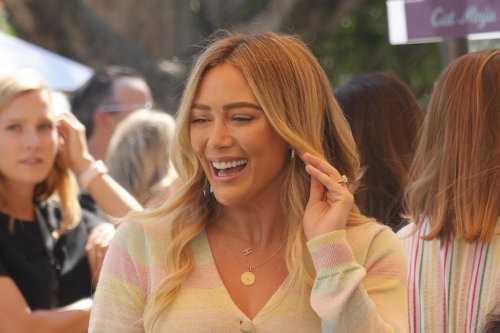 Hilary Duff Enjoys ‘Epic’ Charity Event in Mom Jeans, Colorful Cardigan & Strappy Sandals for Children’s Book Reading