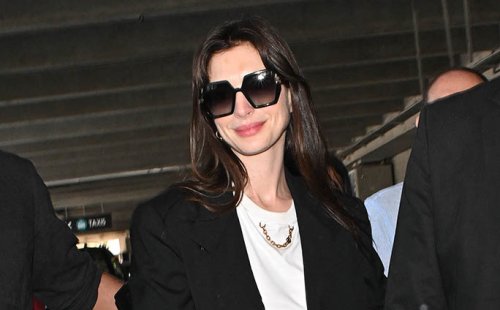 Anne Hathaway Puts Modern Twist on Formal Suiting With Sleek Sneakers Ahead of Cannes Film Festival 2022