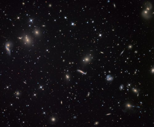 How Would Our Universe Be Different Without Dark Energy?