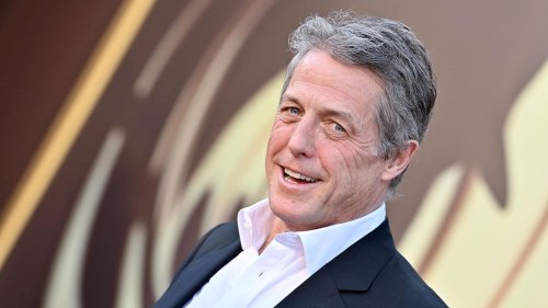 Hugh Grant Settles Lawsuit Claiming Murdoch’s Tabloid Hacked Phone, Broke Into Home