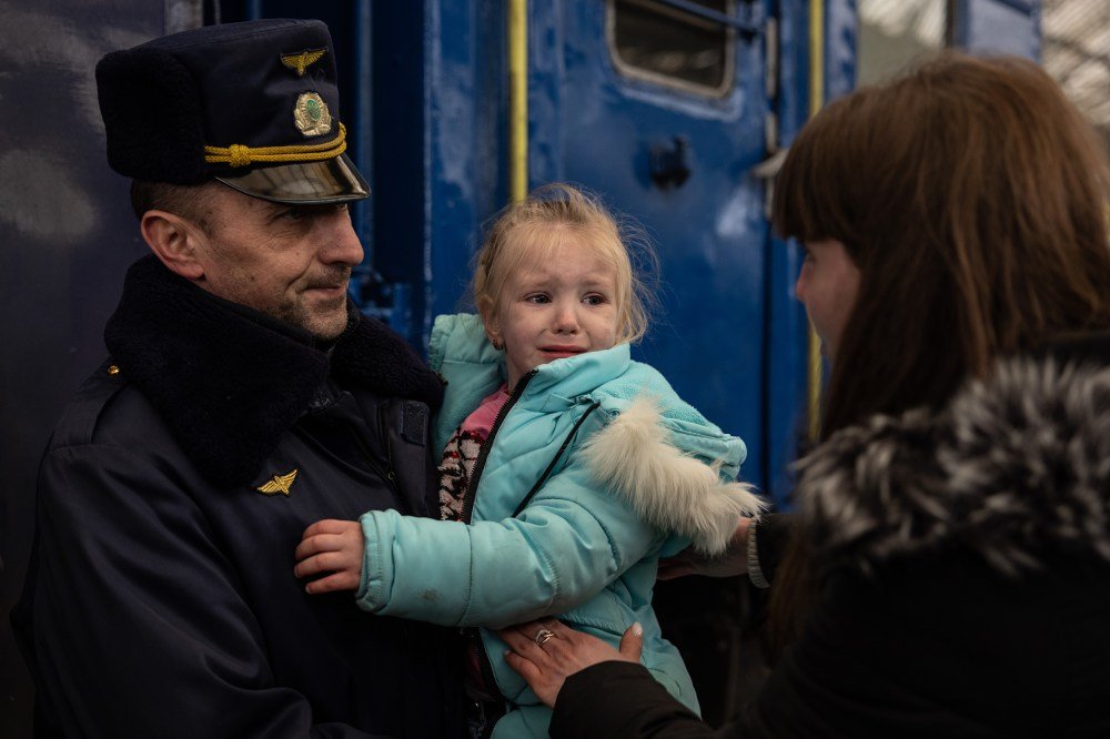 In Ukraine, Refugees Flee West—and Volunteer Fighters Flood to the East