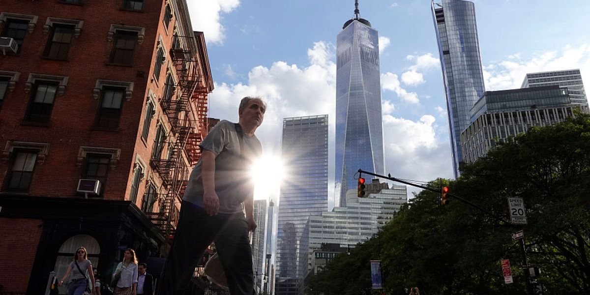 Why do so many global payments still require a layover in New York?