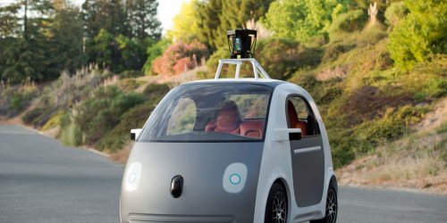 Google partners with auto suppliers on self-driving car