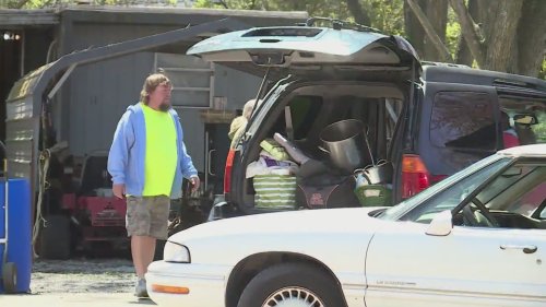People evacuate as Salem, Illinois homes fill with floodwater
