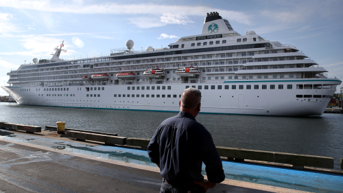 Cruise ship with hundreds of passengers diverts to Bahamas after US issues arrest warrant over unpaid bills