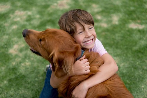 New report claims that kids who grow up with dogs are better behaved