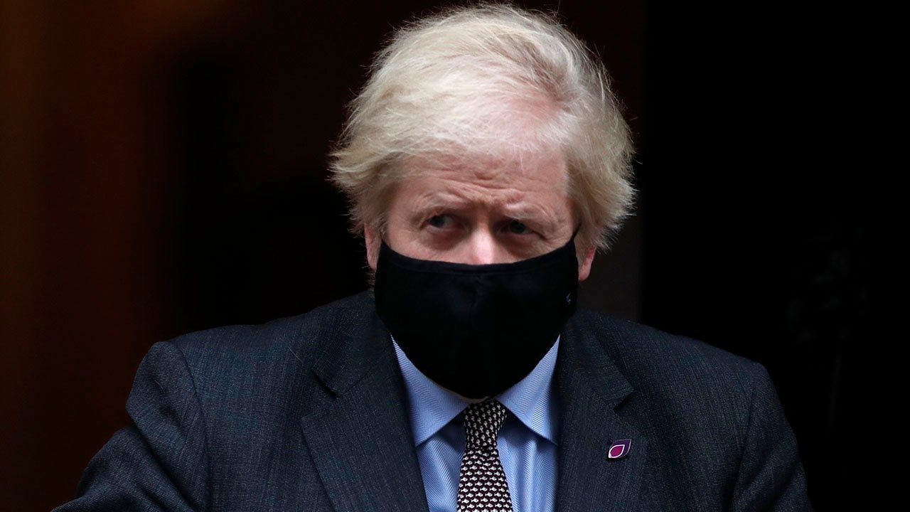 Boris Johnson effectively extends UK coronavirus lockdown after delaying school reopenings