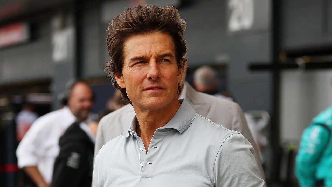 Tom Cruise celebrates 60th birthday watching F1 driver Lewis Hamilton