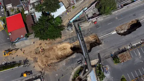Mother, daughter rescued after car plunges into huge Guatemala sinkhole
