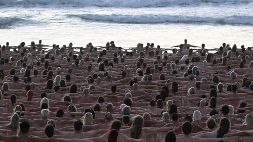 Hundreds pose nude on Australian beach to raise awareness for skin cancer