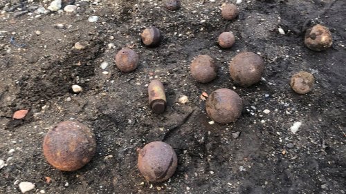 Massachusetts fire officials investigating chance discovery of cannonballs during trench dig