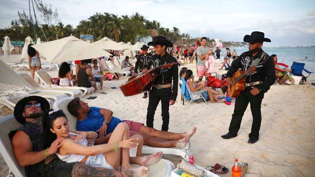 Mexico sees tourism bump as pandemic surges