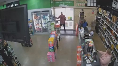 Would-be liquor store thief stopped in his tracks by locked door: video