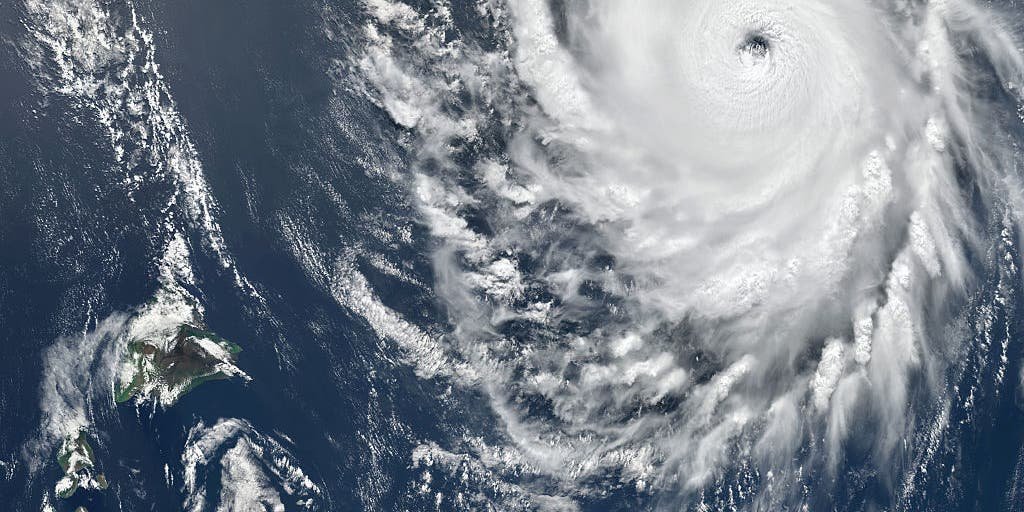 What's the difference between a hurricane making a direct hit and landfall?