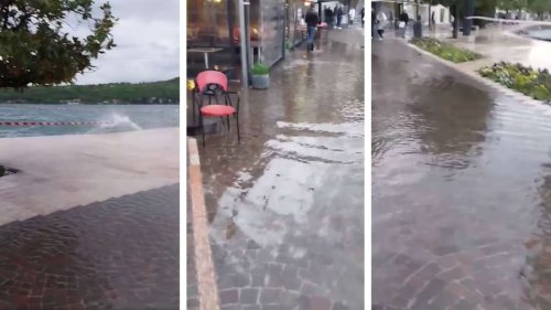 Gardasee in Italien läuft bei Starkregen über: Überschwemmungen fluten Cafés