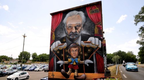 Un graffeur risque 6 000 euros d'amende pour une fresque représentant Emmanuel Macron en marionnette de Jacques Attali