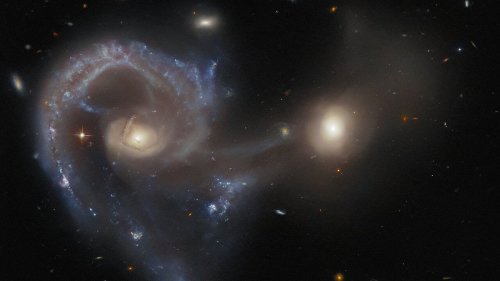 New Hubble telescope image reveals intergalactic bridge between two merging realms