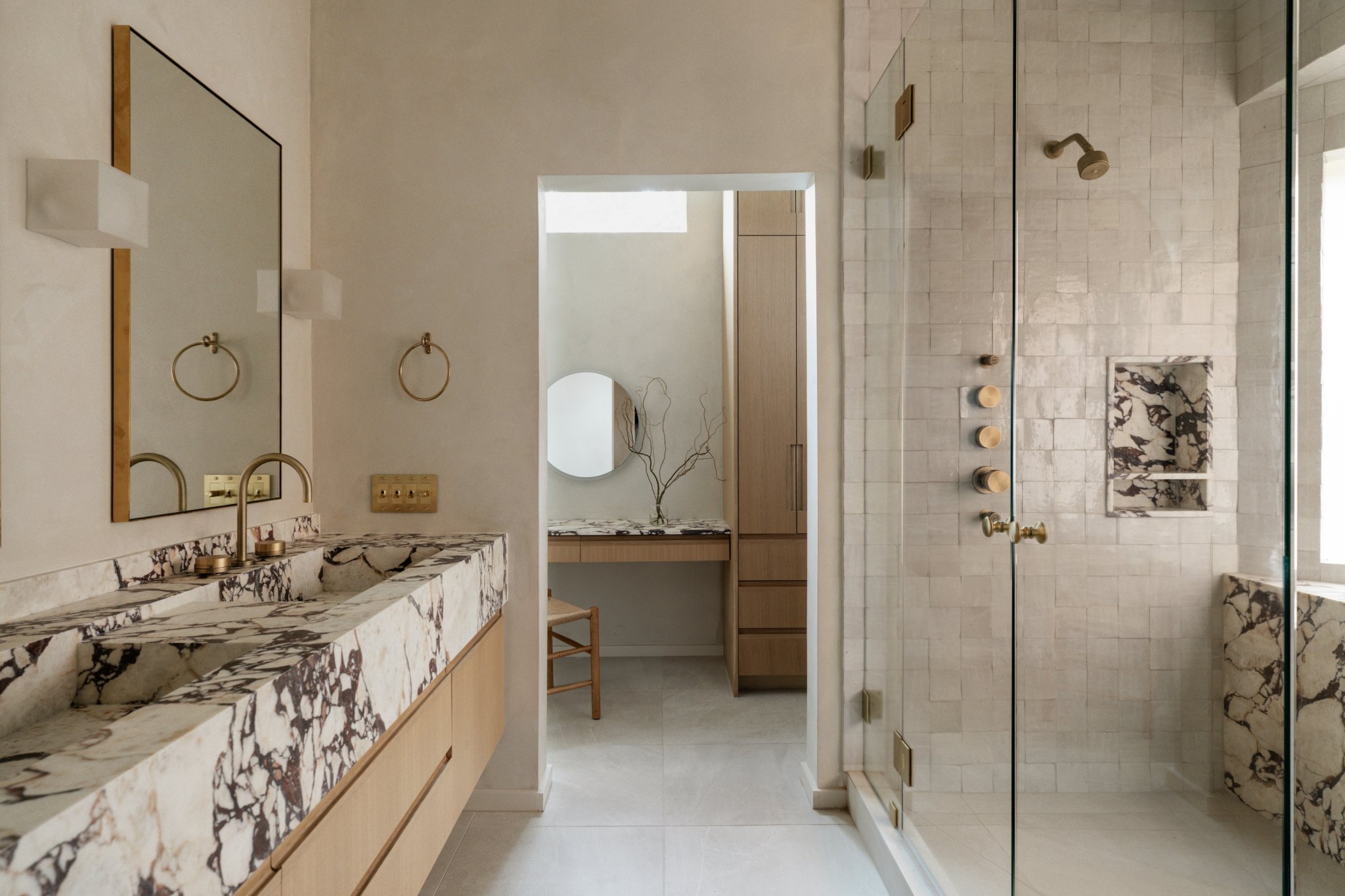 10 ideas interior designers use to create calming bathrooms that feel like at-home spas