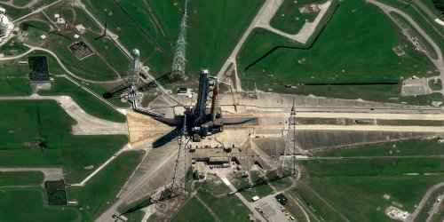 NASA's new moon rocket spotted from space rolling to the launch pad (photos)