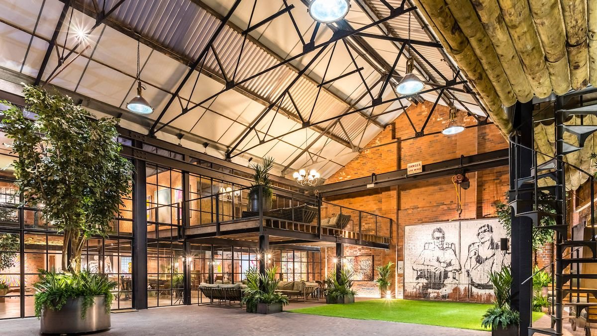 This former textile factory has industrial chic interiors, a speakeasy bar and a 25-seat cinema