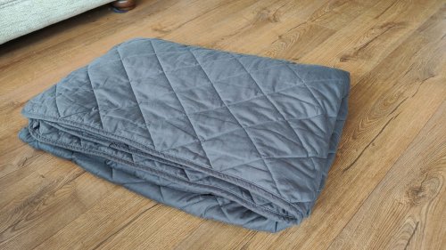 I've used a weighted blanket for over a year — and it's changed the way I sleep