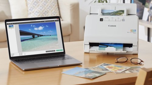 Canon imageFormula RS40 scans your old photo prints in a snap!