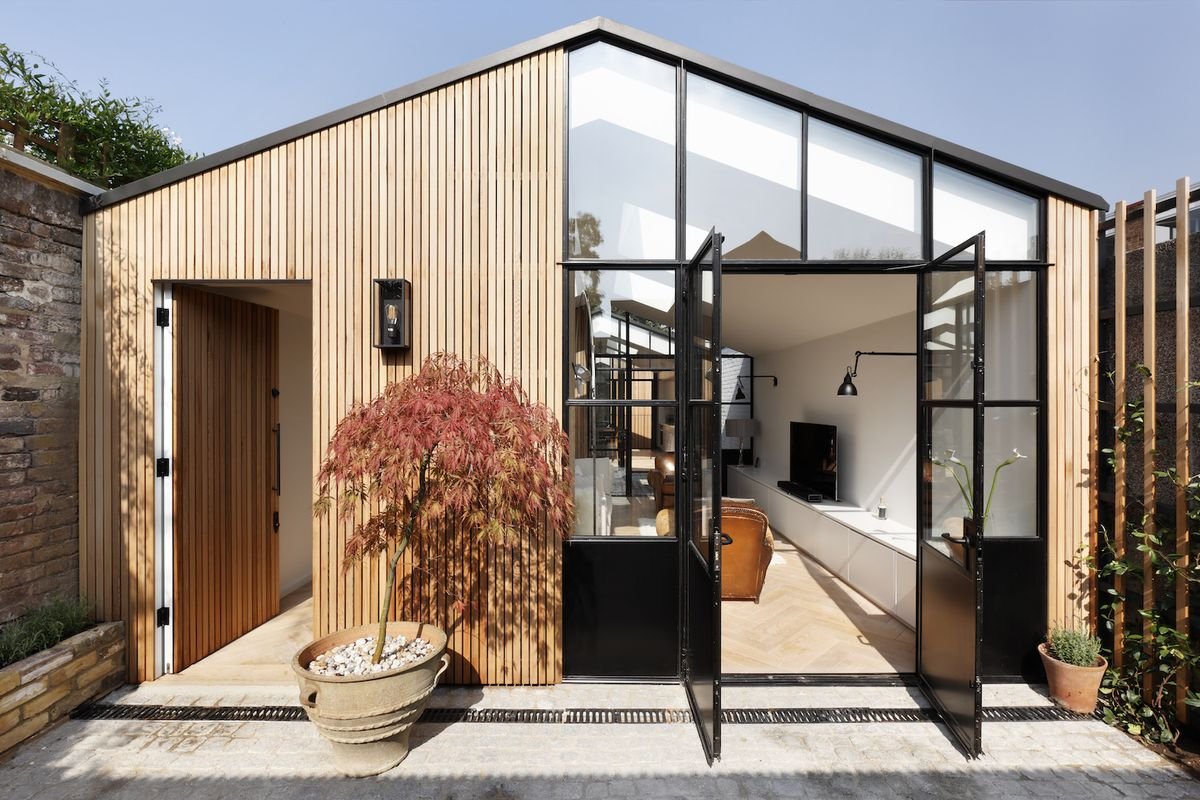 See how a former timber garage was transformed into a modern family home