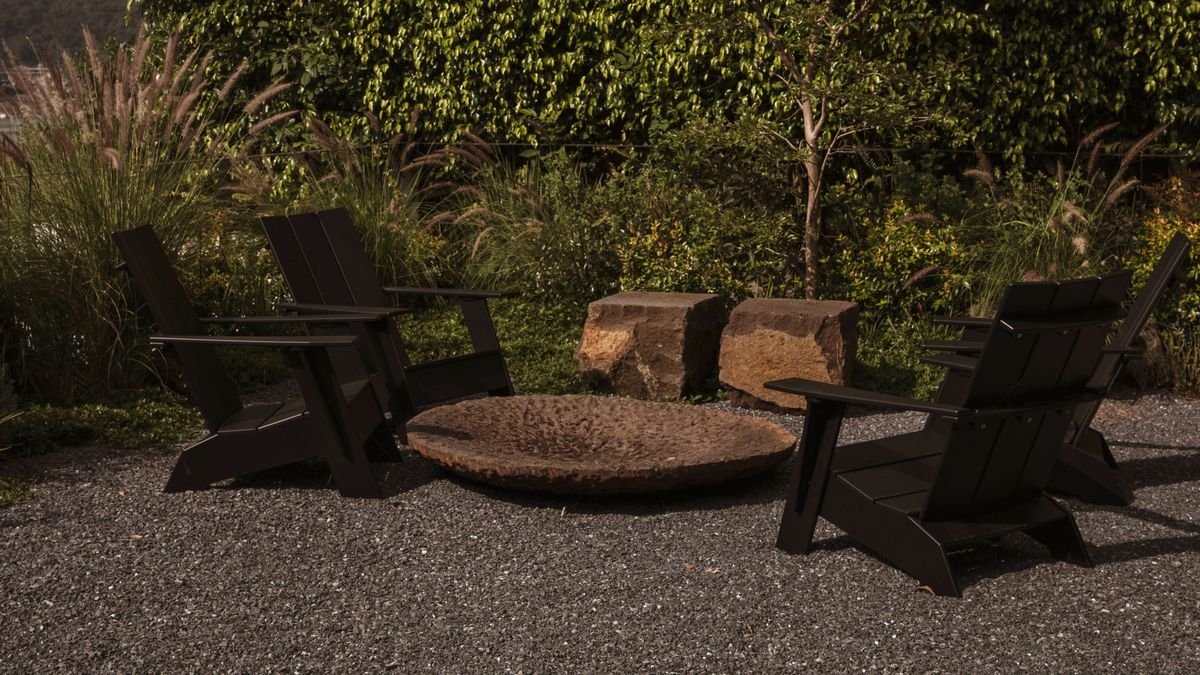 How To Stain Outdoor Furniture The Right Way — "It Enhances Wood's Natural Appeal," Experts Say