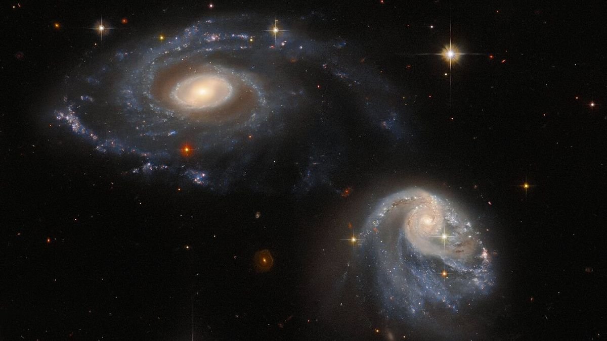 Hubble Space Telescope watches galaxies' destructive dance in new photo