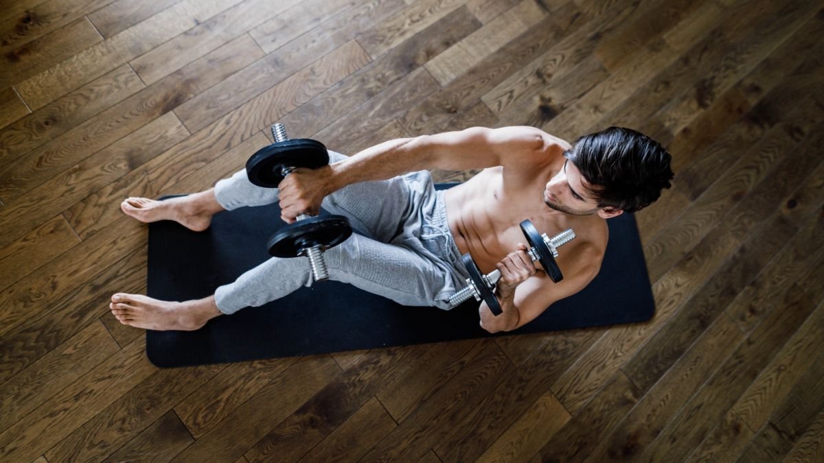 Build a stronger core and boost your balance in just 17 minutes with this weighted abs workout