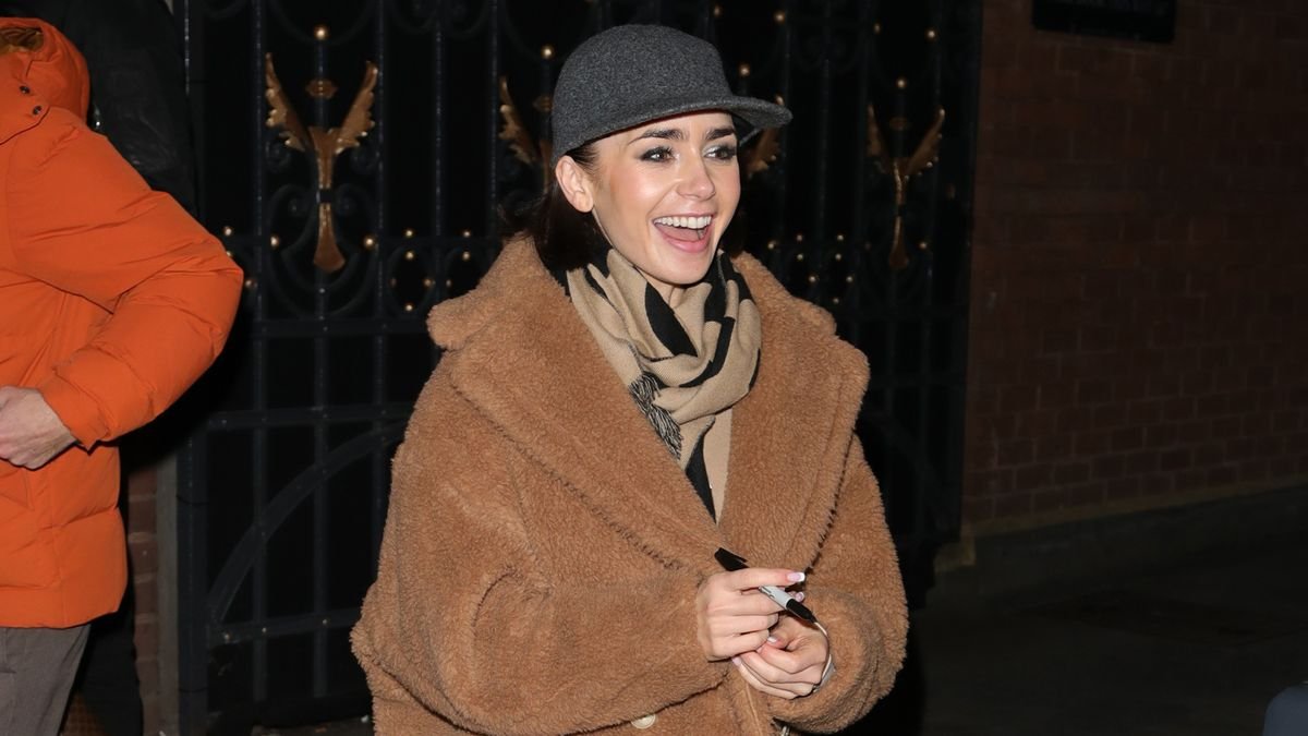Lily Collins Cozies Up to the Teddy Coat Trend in Suede Adidas Sneakers and a Luxe Designer Baseball Cap
