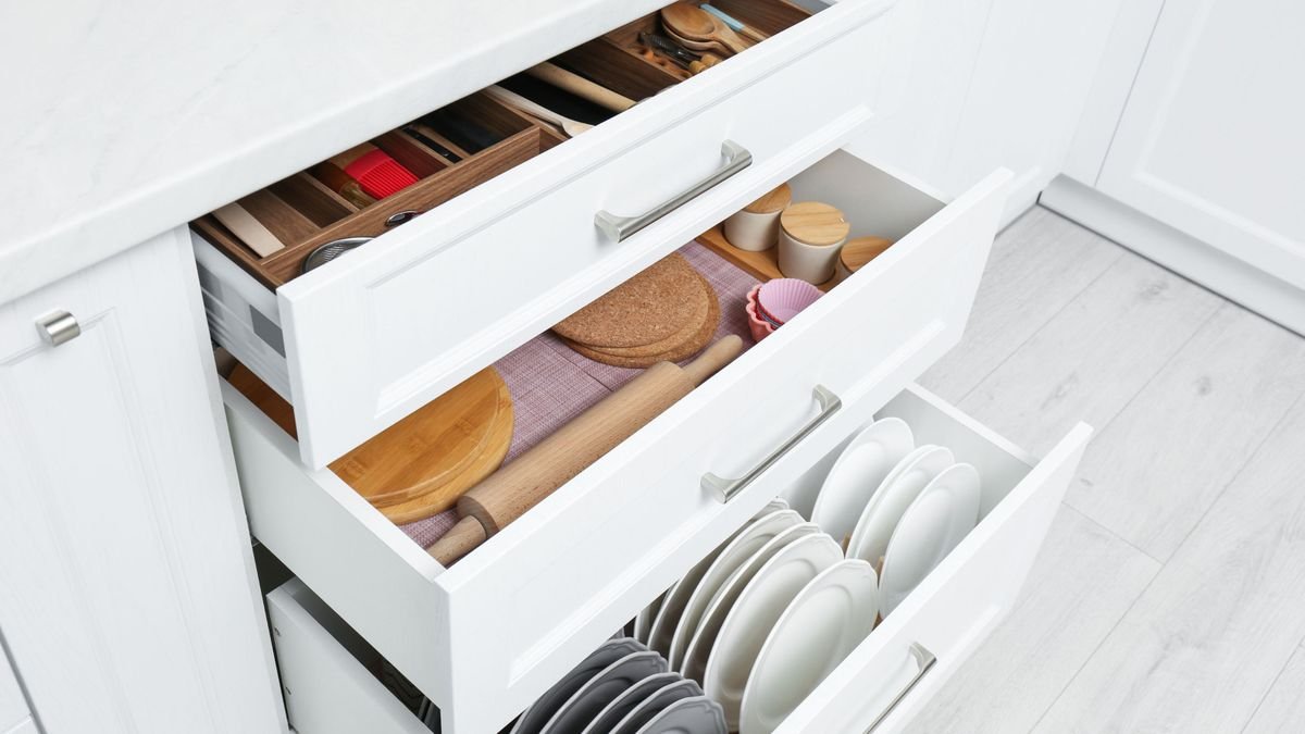 My cutlery and cookware collection was chaotic — but these 7 expert tips helped me organize my kitchen drawers