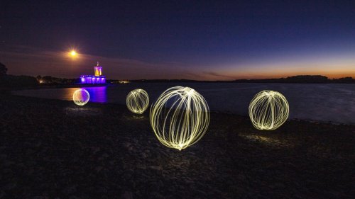 Paint with light at night to create fantastic light orb images