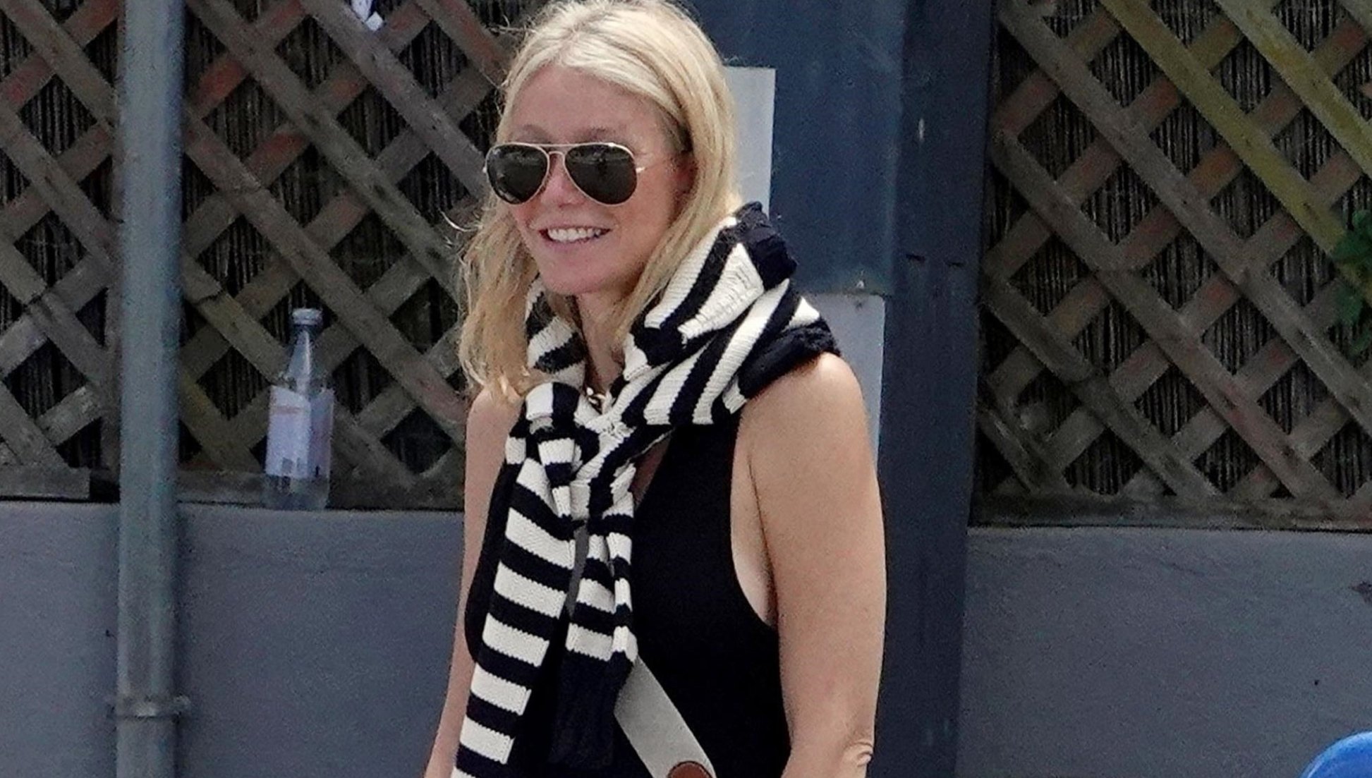 Gwyneth Paltrow's White Linen Pants and Fisherman Sandals Are a Vacation Vision