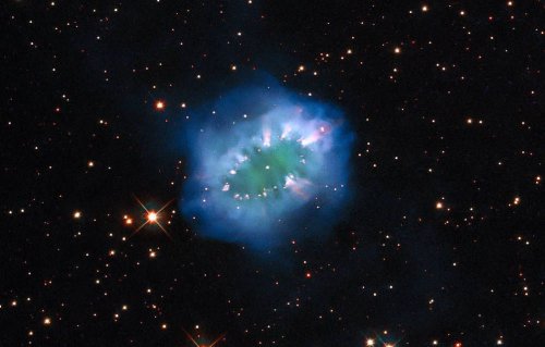 Distant star drowns its partner in gas, forming gorgeous 'Necklace Nebula'