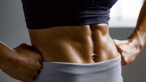 Forget sit-ups — you only need a pair of dumbbells and 7 exercises to sculpt your abs
