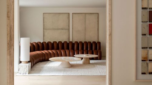 8 Living Rooms With Leather Sofas That Prove This Material is Back in Style