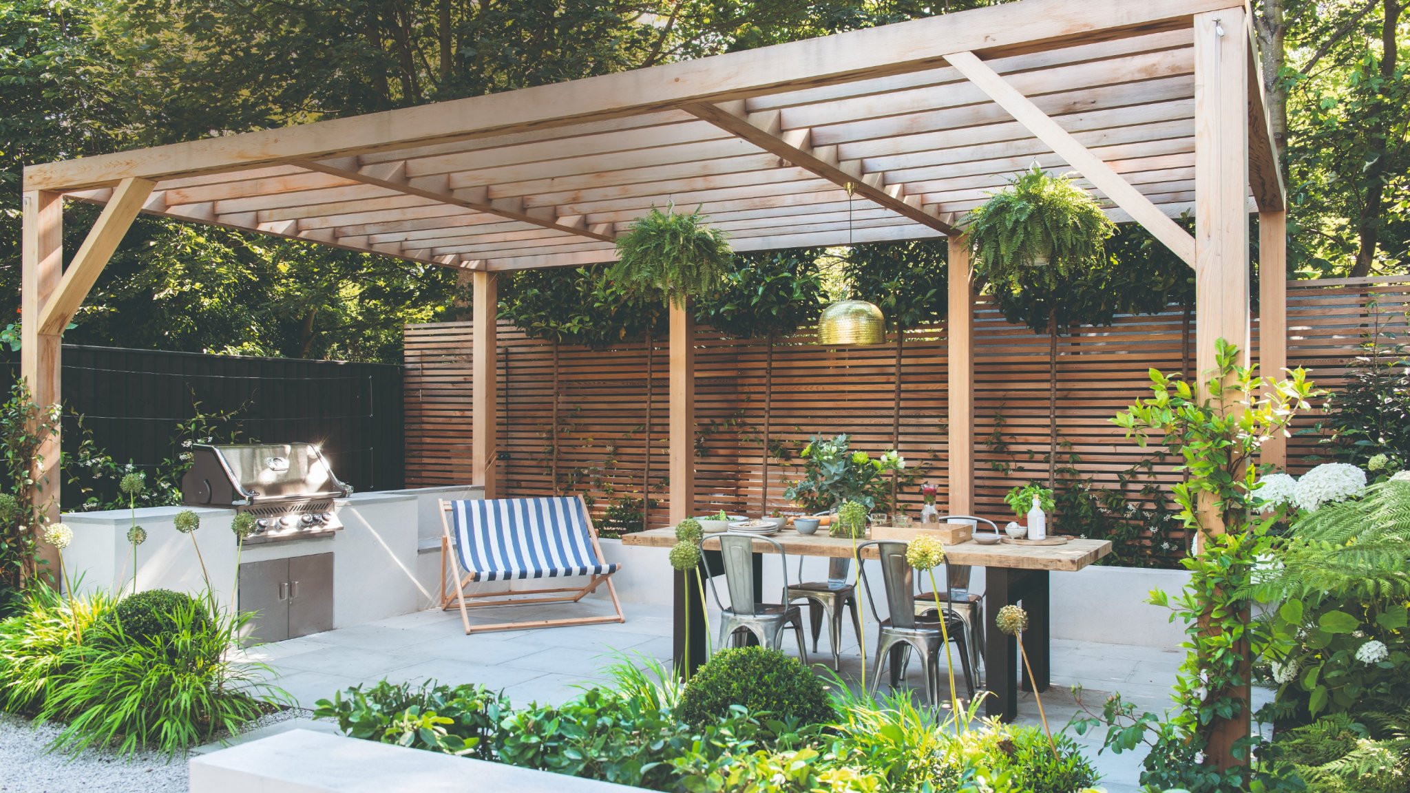 11 covered outdoor kitchen ideas for sheltered cooking and dining
