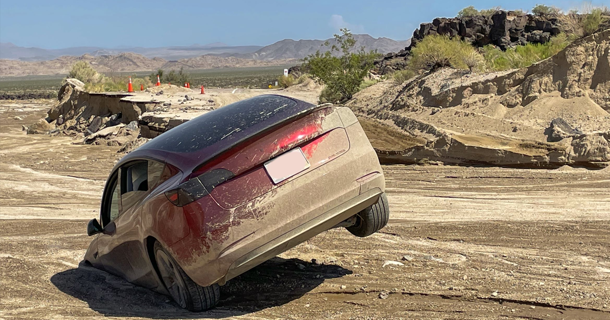 Amazing Photo Shows Tesla That Drove Into Flood Waters, Got Swallowed by the Earth