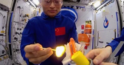 Chinese Astronaut Lights Match in Space