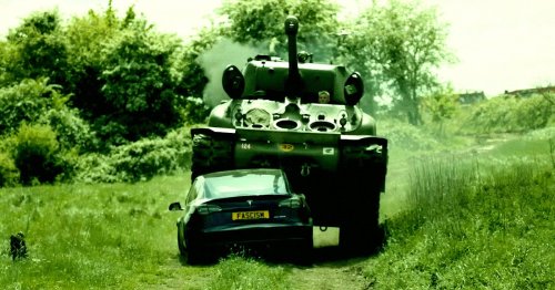 Watch a 98-Year-Old World War II Vet Absolutely Demolish a Tesla With a Tank