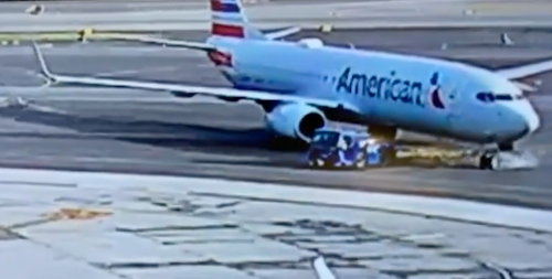 American Airlines plane crushes airplane tug at LaGuardia Airport