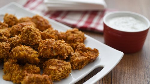 Oven-baked, cornflake-crusted chicken bites are crowd-pleasing appetizers