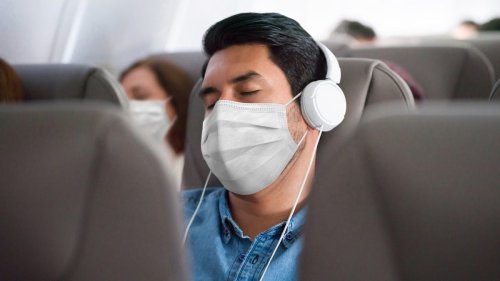 Pro tips for surviving a long flight during a pandemic: Get the right mask, bring a pillow