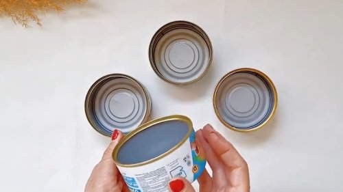 Gardener Makes Charming Outdoor Lights With Leftover Tuna Cans