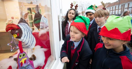 'Sharing it with the public is an honour': Pupils light up High Street windows for 12 Days of Christmas
