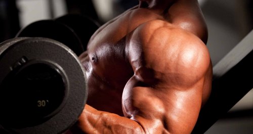 Dumbbell Drag Curl Exercise Guide — How to, Muscles Worked, & Alternatives
