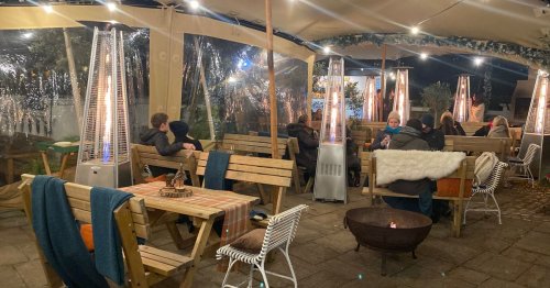 The cosy riverside restaurant with garden fire pits and fairy lights
