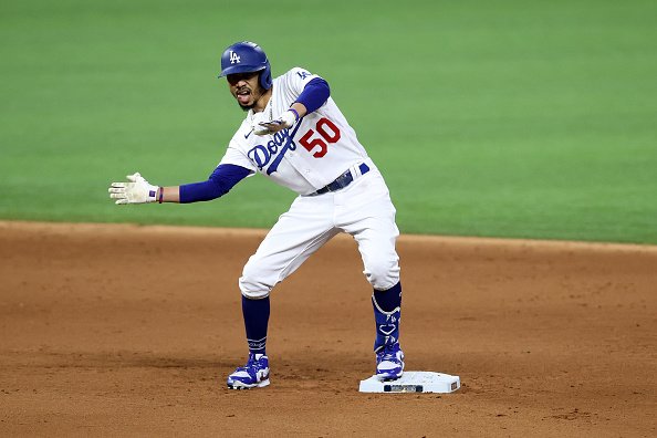 Mookie Betts of the Los Angeles Dodgers celebrates after hitting a...