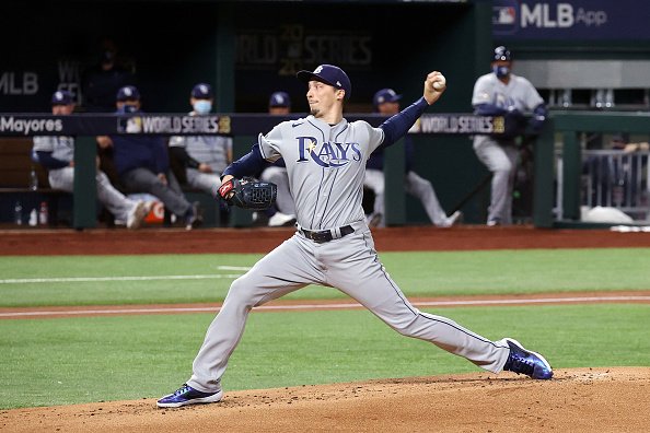 Blake Snell of the Tampa Bay Rays throws a pitch against the Los...